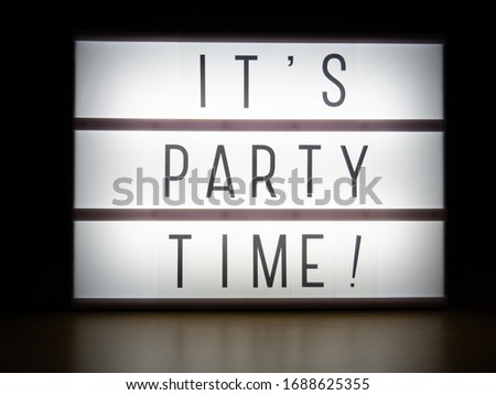 LED light box it's party time message in dark