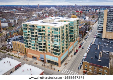 Aerial view of 1550 East Royall Place including North Farwell Avenue and the east side