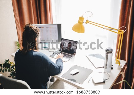 man and woman have conversation online. home office. telework. Royalty-Free Stock Photo #1688738809