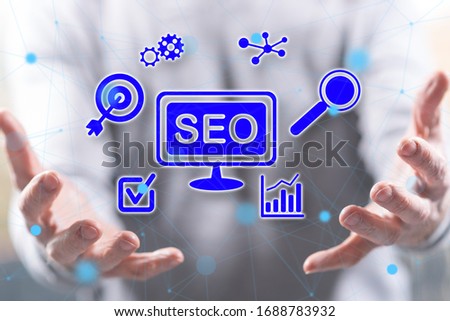 Seo concept above the hands of a man in background