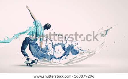 Boy skater riding on board against white background