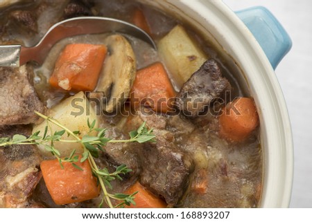Beautiful hearty beef casserole with potatoes, carrots and mushroom Royalty-Free Stock Photo #168893207