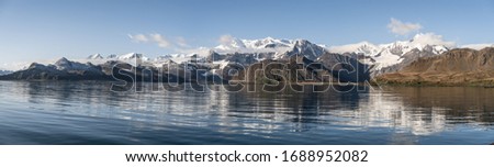 Stunning panorama picture of South Georgia Island Mountains and Glaciers at the Coast of Grytviken - Southern Atlantic Ocean remote island