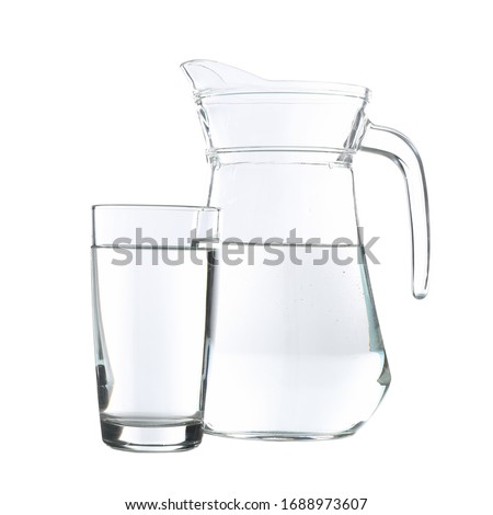 Jug and glass with water isolated on white background Royalty-Free Stock Photo #1688973607
