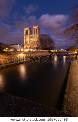 La Cathédrale Notre-Dame de Paris at the Seine river side in Paris, France.