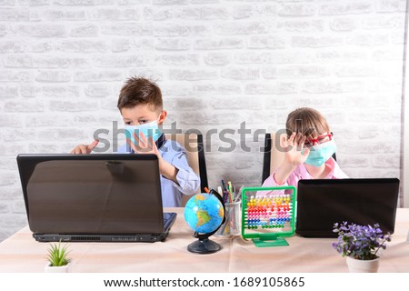 I miss school. children waving their hands and say hello to classmates. Distance learning resources for schools affected by COVID-19. Remote learning going during the coronavirus pandemic. Royalty-Free Stock Photo #1689105865