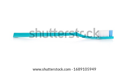 Plastic toothbrush on isolated white Royalty-Free Stock Photo #1689105949