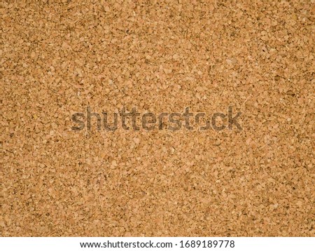 Corkboard background. Brown paper texture. Abstract pattern. Wood backdrop. Cardboard wall. Plywood. Royalty-Free Stock Photo #1689189778