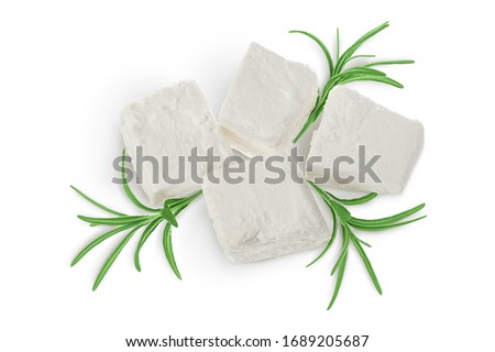 Feta cheese isolated on white background. With clipping path and full depth of field. Top view. Flat lay