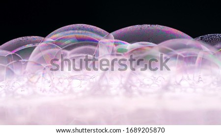 Soap Bubbles Macro shoot. Clean soft elegant bright photo background. Close-up Soap bubbles colors. Washing disinfection. Froth Backdrop. Shoot on Red Dragon camera.