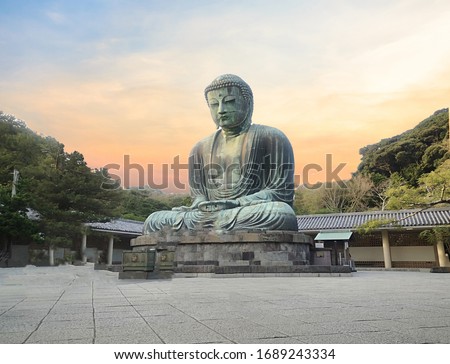 Great Buddha of Kamakura or Kamakura Daibutsu is a large bronze statue of Amida Buddha sits on white background