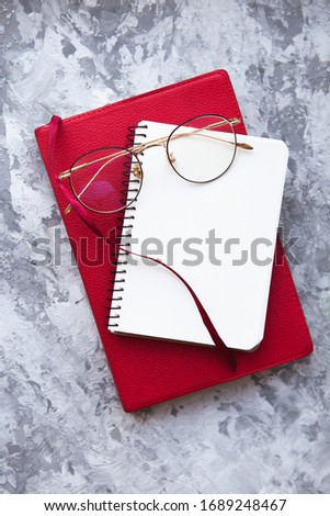 Blank page of white notepad on wire. Stylish background for business advertising.