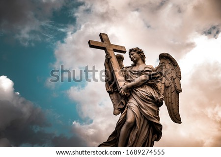 Angel over cloudy sky background, big old monument of hope, religious symbol of Christianity, Bridge of Angels, Rome, Vatican, Italy