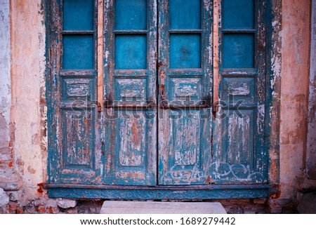 Blue closed vintage wooden doors background