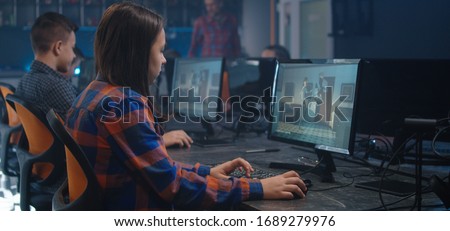 Medium shot of a girl learning 3D design with an animated move in school