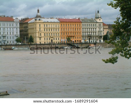 
picture is reported by the floods in prague 2006. It was a disaster,
flooded river Vltava in the center of Prague during floods and bridge pillars