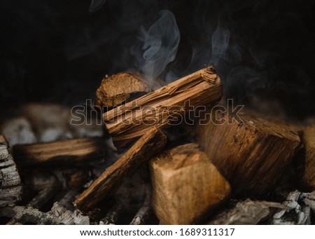 Texas Southern BBQ Brisket being Hickory Smoked on a chamber smoker and grill. Royalty-Free Stock Photo #1689311317