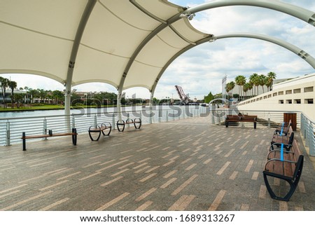 Cityscape view of the Riverwalk area in downtown Tampa along the Hillsborough River.