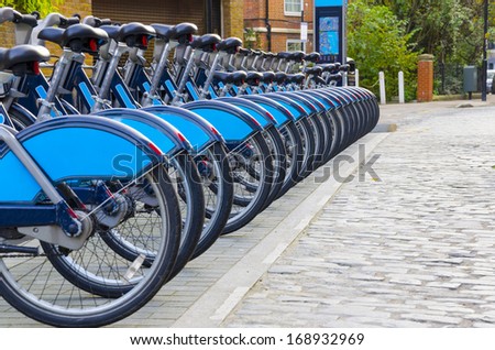 Bikes for Rent, London. - Stock Image, Bikes for rent in London. (introduced in July 2010 across London) Royalty-Free Stock Photo #168932969