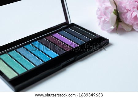 Colorful eyeshadow palette on white background
