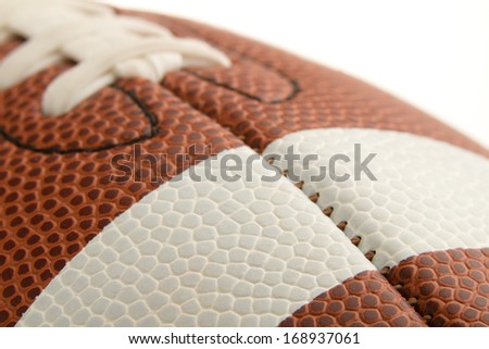 American Football - This is a high key image of a football. Shot with a shallow depth of field with a white background.