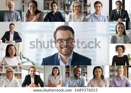 Headshot screen application view of diverse multiracial employees have work web conference using modern platform, smiling multiethnic colleagues talk speak online brainstorm on video call Royalty-Free Stock Photo #1689376015
