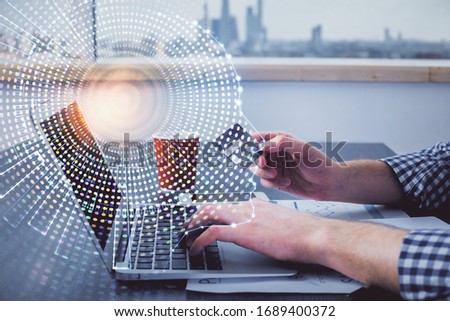 Double exposure of man hands typing on computer with credit card and brain theme drawing. E-commerce and AI concept.