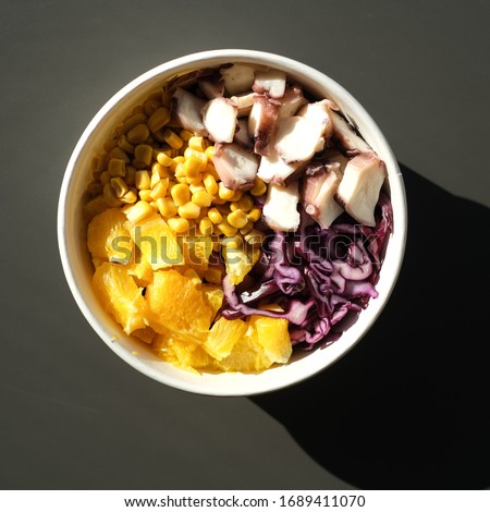 healty bowl: fish, cereals and vegetables