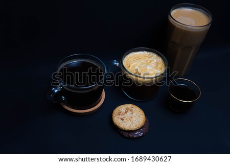 Different kinds of coffee on black  background. Coffee menu. 