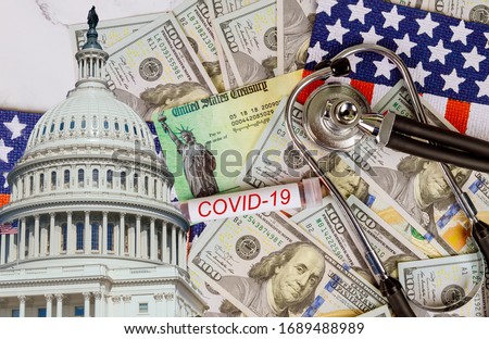 Word COVID-19 on global pandemic lockdown stimulus package financial relief package from government Royalty-Free Stock Photo #1689488989