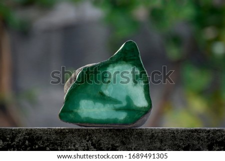 Jade is a real natural jade, lumps on a beautiful natural background. Royalty-Free Stock Photo #1689491305