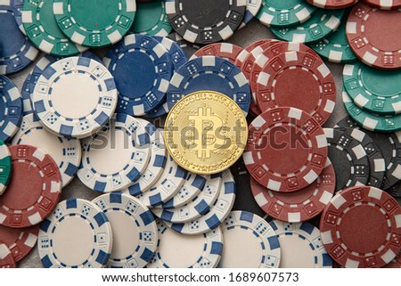 Golden bitcoin on casino chips Royalty-Free Stock Photo #1689607573
