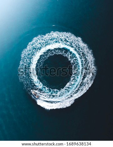 
A donut boat in aerial view Royalty-Free Stock Photo #1689638134