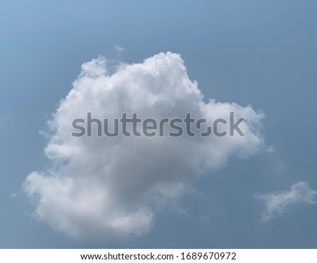 Furry Cumulus clouds White as a cauliflower on a beautiful sunny day