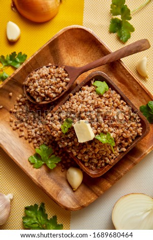 buckwheat on the table in a wooden plate