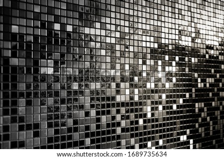 Perspective of black square mosaic tiles for texture background
