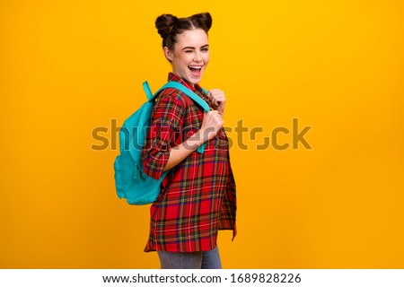 Profile photo of beautiful student lady flirty winking eye first study day walk college lesson lecture wear blue bag casual checkered shirt jeans isolated yellow color background