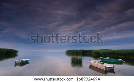 Nida - Curonian Spit and Curonian Lagoon, Nida, Klaipeda, Lithuania. Nida harbour. Baltic Dunes. Unesco heritage. Nida is located on the Curonian Spit. Beautiful summer morning. Royalty-Free Stock Photo #1689924694