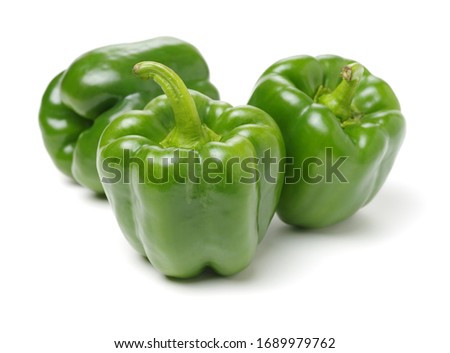 fresh green bell pepper (capsicum) on a white background Royalty-Free Stock Photo #1689979762