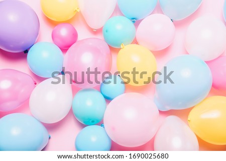 Birthday background with colorful balloons, top view