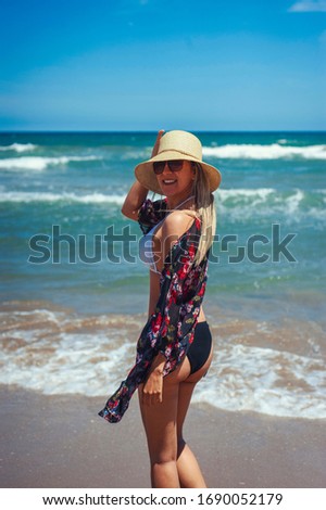 Girl posing on the beach