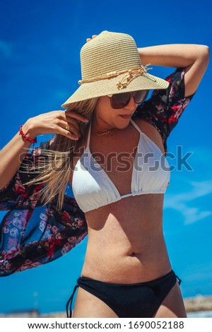 Girl posing on the beach