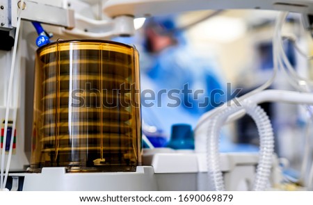 Mechanical ventilation equipment. Pneumonia diagnosting. Ventilation of the lungs with oxygen. COVID-19 and coronavirus identification. Pandemic. Royalty-Free Stock Photo #1690069879