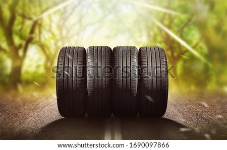 Swap winter tires for summer tires - time for summer tires Royalty-Free Stock Photo #1690097866