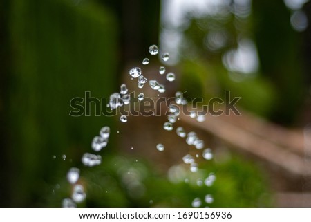Water droplets on a fountain, detail. 