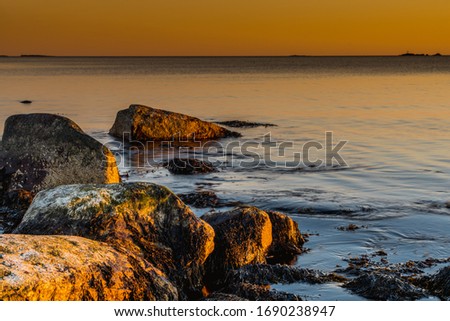 Sunset at Ytre hvaler national park in Norway in Scandinavia Royalty-Free Stock Photo #1690238947