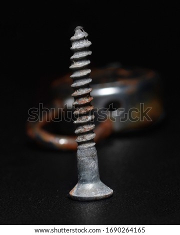 Standing nail in focus and background blur