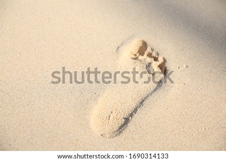 Footprints on the beach Oahu Hawaii