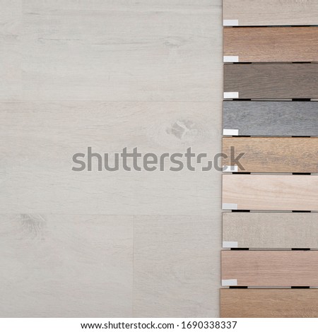 Samples of wooden skirting boards for different types of floors. Interior Design. Repair and construction of the house. Copy space.