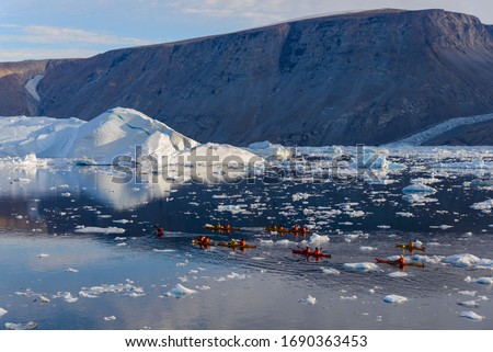 Landscape with iceberg in Greenland at summer time. Sunny weather.